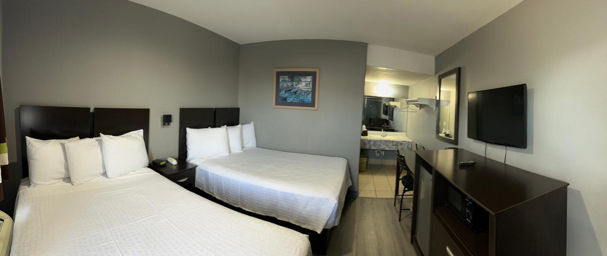 Americas Best Value Inn And Suites Groves Екстер'єр фото